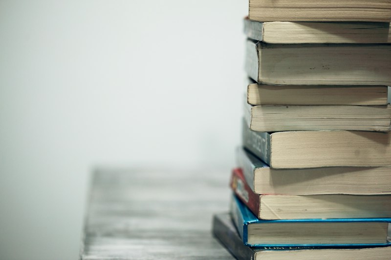Woman reading book in cozy light